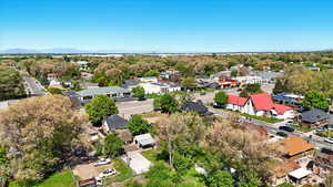 Aerial view of residential area with a tree filled landscape