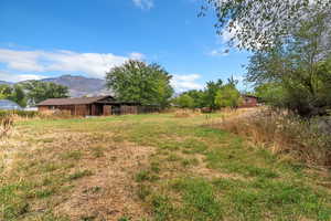 View of yard featuring a mountain view