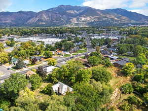 Aerial view of residential area featuring a mountain backdrop