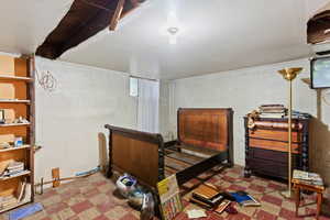 Bedroom with tile patterned floors