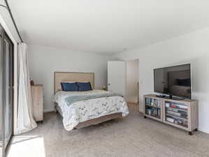 Master bedroom with a newly built balcony with water views.