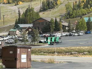 View of asphalt road with street lighting