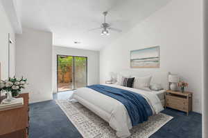 Virtually staged, Carpeted bedroom with vaulted ceiling, access to exterior, a ceiling fan, and a textured ceiling