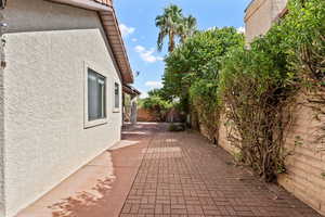 View of home's exterior featuring stucco siding