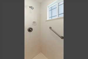 Full bath featuring a shower