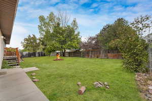View of fenced backyard
