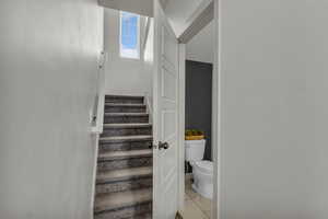 Stairway with tile patterned flooring