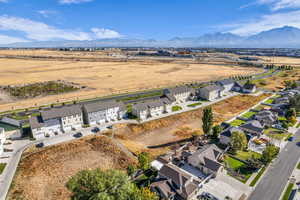 Aerial view of residential area with a mountainous background