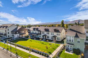 Aerial view of residential area with a mountain backdrop