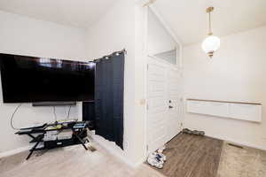 Bathroom with baseboards and wood finished floors