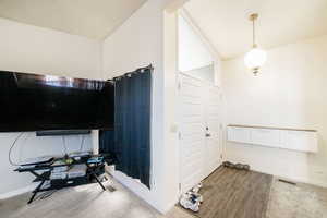 Bathroom featuring baseboards and wood finished floors