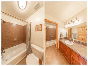 Full bath featuring shower / bath combo with shower curtain, vanity, and light tile patterned floors