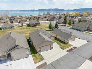 Aerial view of residential area featuring a mountain backdrop