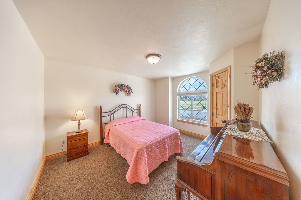 Bedroom featuring carpet flooring