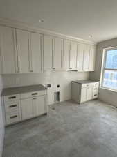 Laundry room with cabinet space and washer hookup