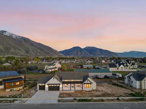 Mountain view featuring nearby suburban area