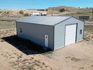 Garage featuring a mountain view
