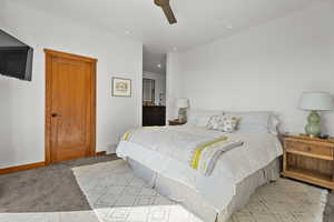 Bedroom with recessed lighting, light colored carpet, and ceiling fan