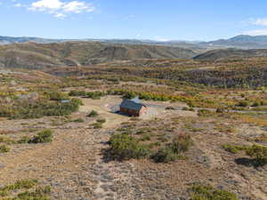 View of subject property featuring mountains