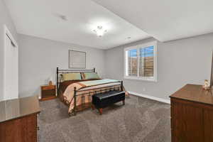 Bedroom 4  with large windows and plantation shutters