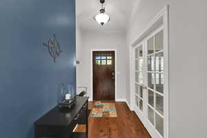 Entryway featuring hardwood floors