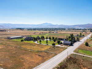 View of mountain backdrop with rural landscape