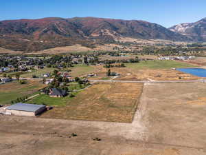 Overview of rural landscape featuring a mountainous background