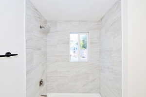 Bathroom featuring  shower combination