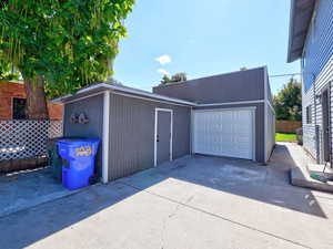 Garage with concrete driveway