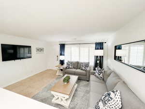 Tiled living room with baseboards