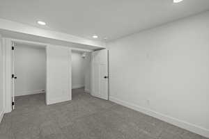 Below grade area featuring cflooring and recessed lighting