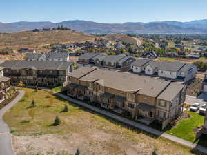 Aerial perspective of suburban area featuring mountains