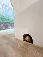 Detailed view of carpet floors and baseboards