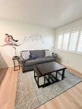 Living room with light wood finished floors
