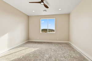 Unfurnished room with ceiling fan and recessed lighting