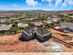 Aerial perspective of suburban area with a mountain backdrop