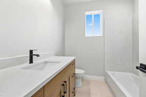 Full bathroom featuring vanity and light tile patterned flooring