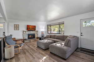 Living area featuring a fireplace and new LVT floors