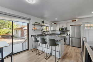 Brand new Kitchen in open floor plan great room featuring marble countertops and  stainless steel appliances