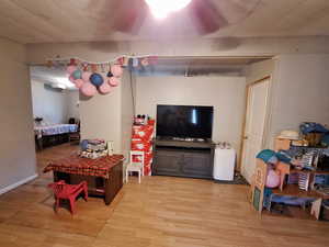 Living room with light wood-style floors