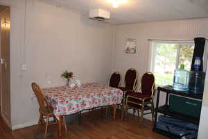 Dining area featuring wood finished floors