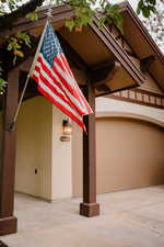 View of building exterior featuring a garage