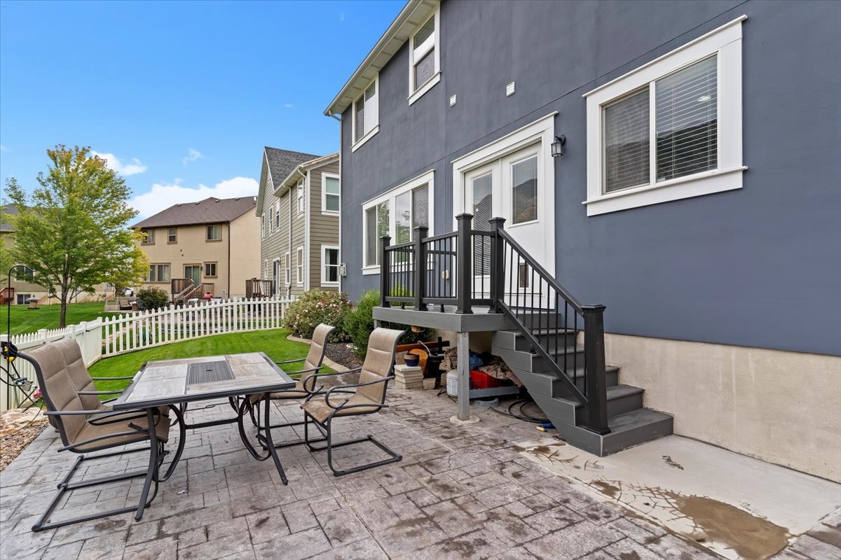 View of patio / terrace with a residential view and outdoor dining area