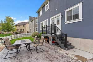 View of patio / terrace with a residential view and outdoor dining area