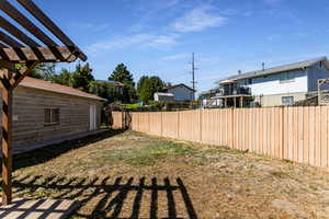 View of yard with a pergola