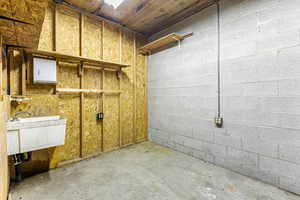 Inside view of detached garage - storage area with a sink