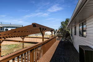 Wooden deck featuring a residential view