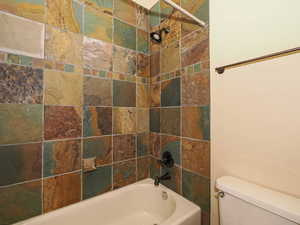 Full bathroom with bathtub / shower combination and toilet