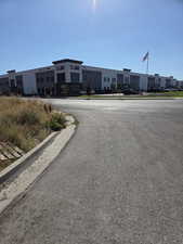 View of asphalt street with curbs