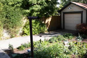 Garage featuring driveway
